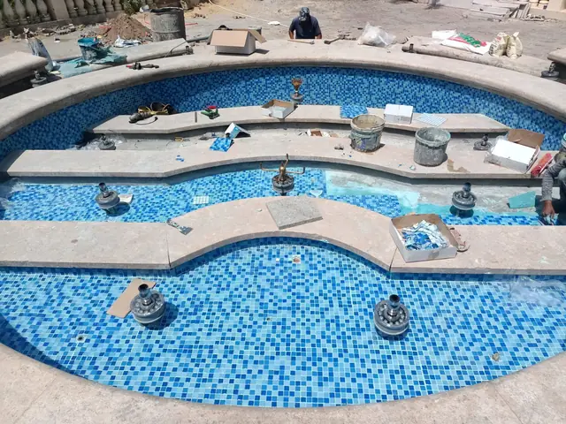 Installing nozzles and lights across the basin levels