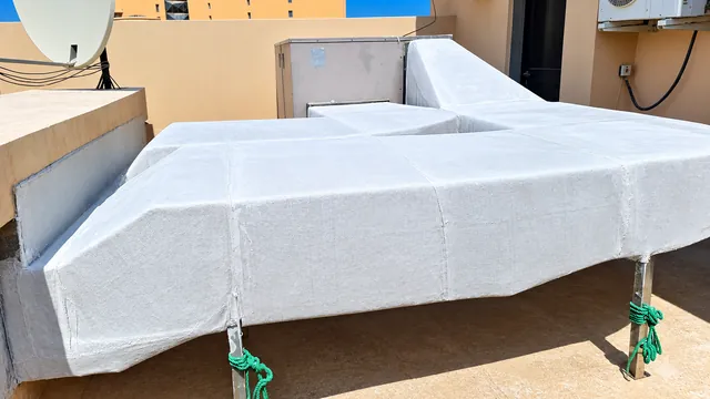 Insulating an external duct run on the roof