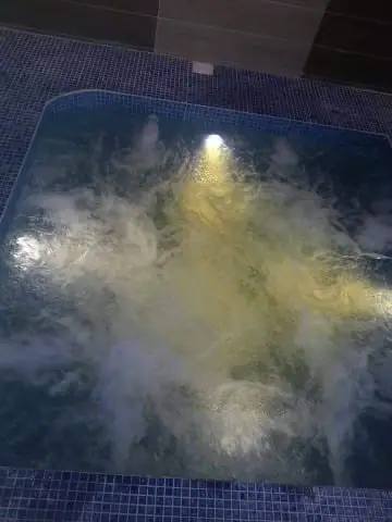 Spa with air-bubble jets and underwater lighting at night