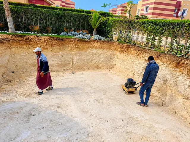 Levelling and compacting the excavation