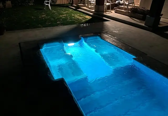 Pool lighting and lounge zone at night