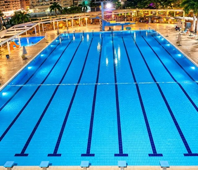 Semi-Olympic pool at night after completion