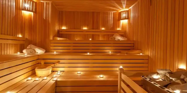 Sauna with warm under-bench lighting