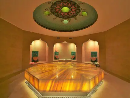 Concept: hammam hall with lit platform and decorated dome